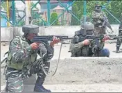  ?? ANI ?? Security personnel take up positions near encounter site in ■
Pulwama on Saturday.