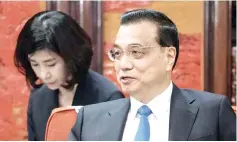  ?? — Reuters photo ?? Li Keqiang in Beijing, China. China is entirely capable of achieving its full-year growth target and controllin­g systemic risks despite many challenges facing its economy, Li said on Tuesday.