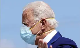  ?? Photograph: Carolyn Kaster/AP ?? Joe Biden wearing two masks.