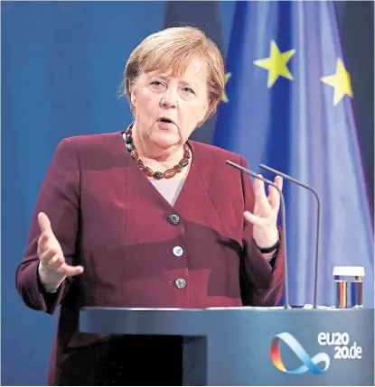  ?? Afp ?? Angela Merkel da una conferenci­a de prensa tras el cierre de la cumbre
