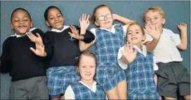  ?? Picture: EUGENE COETZEE ?? SEEING DOUBLE: Summerwood Primary School’s Grade 1 class was blessed with three sets of twins. From left are siblings Plawu and Simalo Nobatyi, Olivia and Rachel Mowbray, and Lily and Oliver Jopson