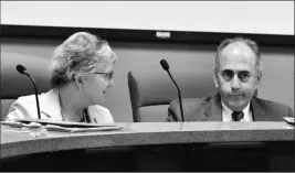  ??  ?? STATE SCHOOLS CHIEF DIANE DOUGLAS AND LUCAS NARDUCCI, president of the state Board of Education, chat ahead of Monday’s board meeting to discuss revamping science and social studies standards.