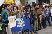  ?? ABEL URIBE / CHICAGO TRIBUNE ?? Chicago-area high-school students lead thousands at Chicago’s March for Our Lives rally at Union Park on Saturday.