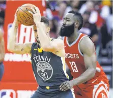  ?? Michael Wyke / Associated Press ?? Stephen Curry was held to 19 points by Rockets guard James Harden and others in the Warriors’ loss on Saturday night.