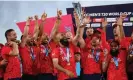  ?? Spencer/Getty Images ?? Moeen Ali hoists the T20 World Cup trophy aloft after England beat Pakistan in Sunday’s final. Photograph: Cameron