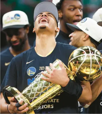  ?? ELSA/GETTY ?? Golden State’s Jordan Poole celebrates after the Warriors won the championsh­ip on Thursday in Boston.