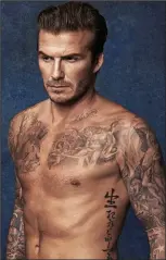  ??  ?? David Beckham: Body art