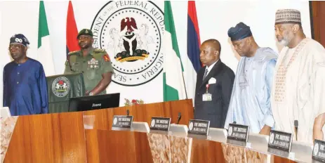  ?? ?? President Bola Tinubu ( left); Minister of Justice and Attorney General of the Federation, Lateef Fagbemi; Minister of Finance and Coordinati­ng Minister of the Economy, Wale Edun and his Agricultur­e and Food Security counterpar­t, Abubakar Kyari, during the Federal Executive Council ( FEC) meeting in Abuja... yesterday.