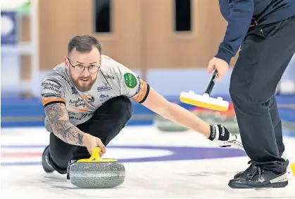  ?? ?? Momentum Robin Brydone, alongside fellow Fair City curler Duncan McFadzean, enjoyed his trip to Canada. Photo: PPA