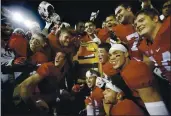  ?? JIM GENSHEIMER — BAY AREA NEWS GROUP, 2015 ?? With the Stanford Axe trophy, Stanford players celebrate their 35-22 victory over Cal at Stanford Stadium on Nov. 21.