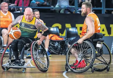  ??  ?? Former Kyabram boy Jeff Wright (left) is set to play for Sydney Blues in the National Wheelchair Basketball League.