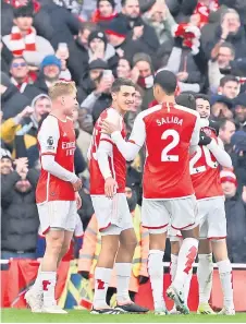  ?? — AFP photo ?? Martinelli (right) celebrates after scoring his team fifth goal during the English Premier League football match between Arsenal and Crystal Palace at the Emirates Stadium.