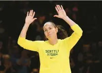  ?? SEAN D. ELLIOT/THE DAY ?? Seattle guard Sue Bird reacts to the crowd as she is honored by the Sun before Thursday’s game in Uncasville. Bird has announced she’s retiring at season’s end.