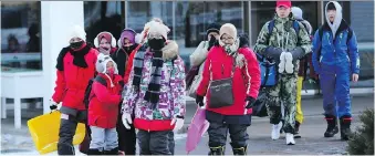  ?? AHN YOUNG-JOON/THE ASSOCIATED PRESS ?? The temperatur­e with wind chill could be -14 C for the opening ceremonies of the PyeongChan­g Winter Games.