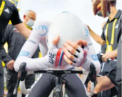  ?? Photos / AP ?? A huge effort on the final time trial saw Tadej Pogacar (pictured) crush fellow Slovenian Primoz Roglic for the yellow jersey.