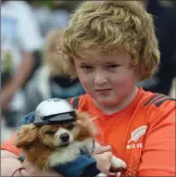  ??  ?? Kieran O’Sullivan with his dog, Chico, at the BikeFest dog show. Photo by Don MacMonagle.