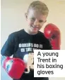  ??  ?? A young Trent in his boxing gloves