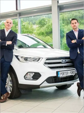  ??  ?? Brothers David and Raymond Porter who set up new Ford dealership in Castlebald­win