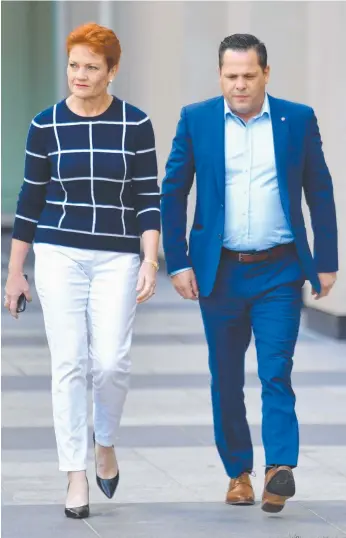  ?? Picture: AAP ?? One Nation senators Pauline Hanson and Peter Georgiou arrive at a press conference at Parliament House in Canberra yesterday.