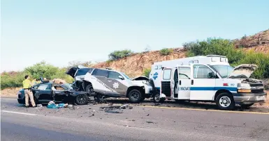  ?? ARIZONA DEPARTMENT OF PUBLIC SAFETY/2020 ?? A Tesla crashed into a police vehicle in Cochise County, Arizona, causing it to hit an ambulance.