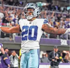  ?? BRACE HEMMELGARN/USA TODAY SPORTS ?? Cowboys running back Tony Pollard celebrates a touchdown against the Vikings.