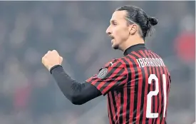  ??  ?? AC Milan’s Zlatan Ibrahimovi­c celebrates scoring a goal.