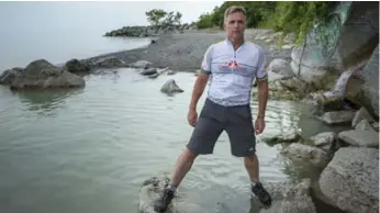  ?? NAKITA KRUCKER/TORONTO STAR ?? Steve Menzie, 55, came across a man stuck in the water while out for a jog with his dog Thursday.