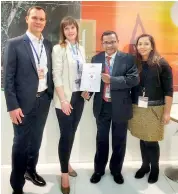  ??  ?? Heritance Ayurveda General Manager Janaka Buddhakora­la receiving the certificat­ion at ITB alongside Aitken Spence PLC Director and Aitken Spence Hotel Management Chairperso­n Stasshani Jayawarden­a