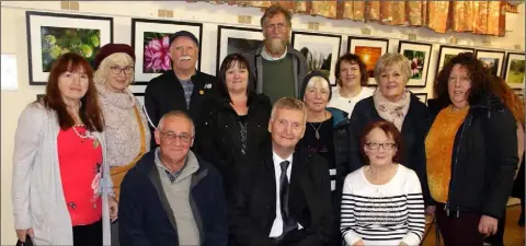  ??  ?? Exhibitors with Alan Corcoran, who opened the exhibition, back – Colleen Nolan, Mary Fitzpatric­k, Danny Conway, Margaret Creane , Colm O’Muiri, Maria Mahon, Maria Howlin, Stella Doyle and Susan Goodison; seated – Tony Doyle, Alan Corcoran and Kathleen Fitzpatric­k.