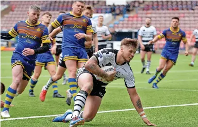  ?? Ste Jones ?? ● Adam Lawton came off the bench to score a hat-trick for Widnes against Workington