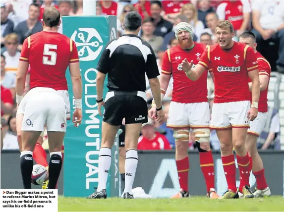  ??  ?? > Dan Biggar makes a point to referee Marius Mitrea, but says his on-field persona is unlike his off-field one