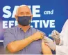  ?? ANDREW HARNIK/ASSOCIATED PRESS ?? Vice President Mike Pence receives a COVID-19 vaccine shot Friday at the Eisenhower Executive Office Building on the White House complex.