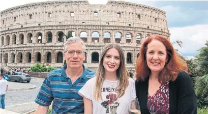  ?? HILARY SHENFELD PHOTOS CHICAGO TRIBUNE/TNS ?? Ron and Hilary Shenfeld with their daughter Samantha outside the Colosseum in Rome, one of the highlights on their itinerary.