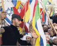  ??  ?? Israelis from the Druze community participat­e in a rally against Israel’s Jewish Nation bill in Tel Aviv yesterday.