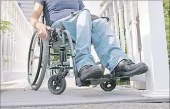  ?? Huntstock / Getty Images / Disability­Images ?? WHEELCHAIR USERS have needs when booking vacation rentals. Online services are trying to help.