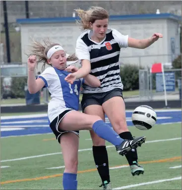  ??  ?? LaFayette’s Lilly Sosebee collides with Ringgold’s Kylee Culpepper during a match in Ringgold this past Thursday. The Lady Ramblers scored a 2-1 victory. (Messenger photo/Scott Herpst)