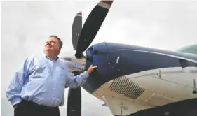  ?? PHOTO BY JEFF ROBERSON/AP ?? Air Choice One CEO Shane Storz flies small planes to destinatio­ns in the Midwest and participat­es in the Department of Transporta­tion’s Essential Air Service subsidy program.