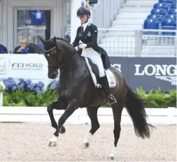  ??  ?? Juliette Ramel and Buriel KH (by Osmium) catch the eye with a valuable personal best performanc­e for Sweden, scoring plus-75%