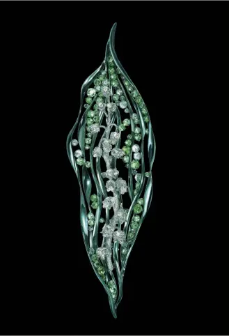  ?? feng-j.com ?? “Lily of the Valley” Brooch - Tsavorite, colored sapphire, chrysobery­l, rose-cut diamond, diamond,
18K electropla­ted gold.