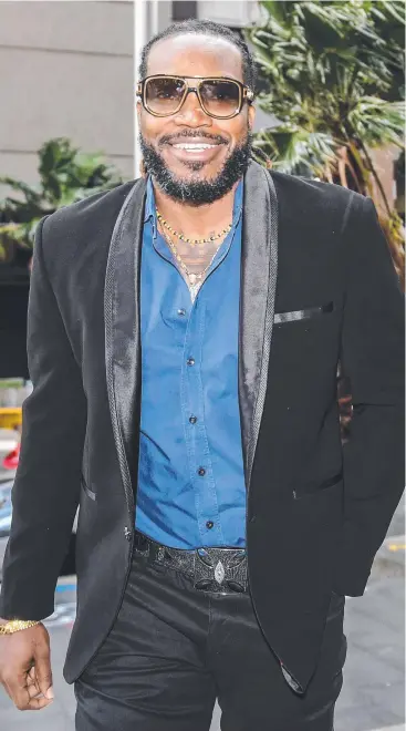  ?? Picture: AAP IMAGE/BRENDAN ESPOSITO ?? SHOCKED: West Indies cricket star Chris Gayle arrives at the NSW Supreme Court in Sydney yesterday for his defamation case.