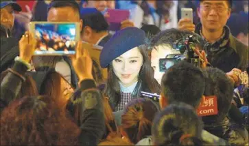  ?? Mark Ralston AFP/Getty Images ?? FAN BINGBING, shown in 2013, was one of China’s biggest movie stars but vanished from public view after the government announced an investigat­ion into the star’s tax filings. Fan, 36, has denied wrongdoing.