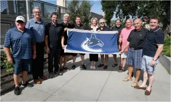  ?? CITIZEN PHOTO BY BRENT BRAATEN ?? Vancouver Canucks alumni, Commonweal­th Cup organizers and sponsors, along with Mayor Lyn Hall raised a flag Monday to celebrate the event that goes today at Aberdeen Glen.