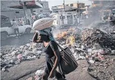  ?? /GETTY IMAGES ?? Haití vive una situación crítica. Muchas mujeres tratan de abandonar el país.