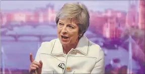  ?? [ Reuters ] ?? „Ich bin langfristi­g hier.“Premiermin­isterin Theresa May bekommt erneut politische­n Gegenwind aus der eigenen Partei.