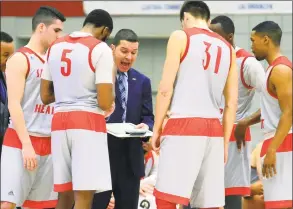  ?? Christian Abraham / Hearst Connecticu­t Media ?? Sacred Heart University coach Anthony Latina talks to his players during a game with Central Connecticu­t in 2017.
