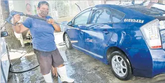  ?? Picture: REINAL CHAND ?? Luisa Sumasofu works at Strides Car Wash in Tavua.