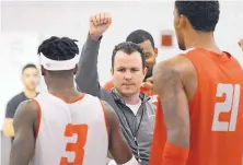  ?? JOURNAL FILE ?? Paul Weir, who is entering his second season as basketball coach at New Mexico, has seen his yearly compensati­on package increase to $675,000.