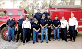  ?? SALLY CARROLL/MCDONALD COUNTY PRESS ?? The Goodman Area Fire Protection District took a hit in April when a tornado destroyed the fire station, but regrouped and continues to serve the Goodman community. The all-volunteer group includes: left, Bud Gilmore, Keith Holloway, Bud Richmond,...