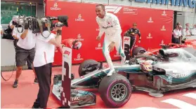  ?? AP PHOTO/JENS MEYER ?? ADVANTAGE. Lewis Hamilton may lead the drivers standings but the British driver thinks Ferrari has all the advantage going into the Hungarian Grand Prix.