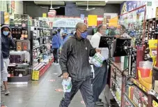  ?? /Antonio Muchave ?? Hammered sector: Independen­t liquor stores have experience­d turbulent times during the various bans on alcohol sales imposed by the government.